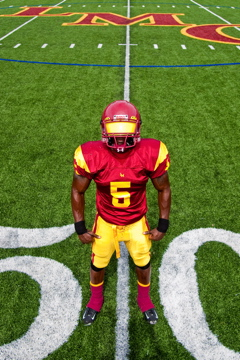 football player at the 50 yard line