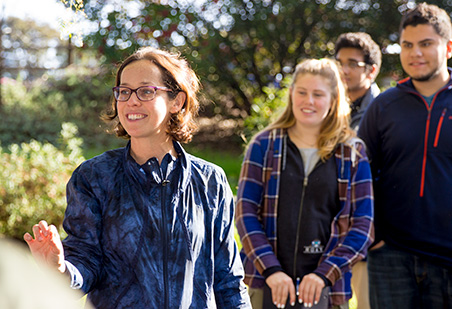 Biology Professor Briana McCarthy leads her class in the LMC California Native Plant Area 