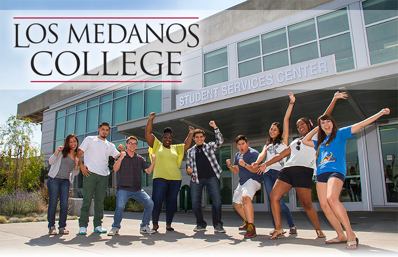 Students in front of the student services building