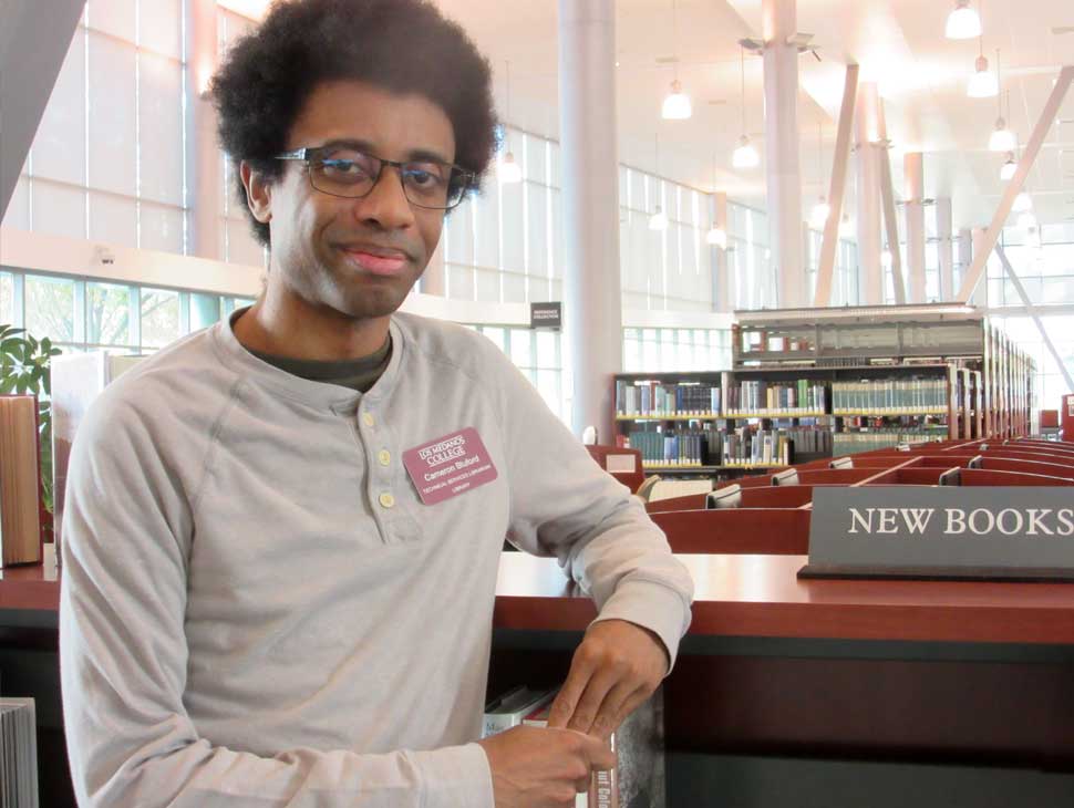 From retail to research repositories, Cameron Bluford discovered his path