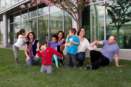 Adults and children on lawn