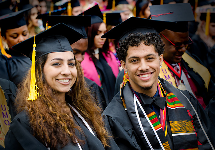 Students smiling at graduation